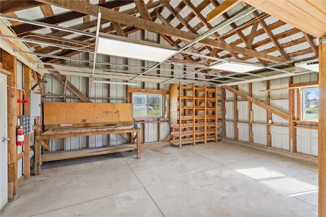 6119 28th Ave Dr, Vinton, IA 52349 - miscellaneous room featuring concrete floors and vaulted ceiling