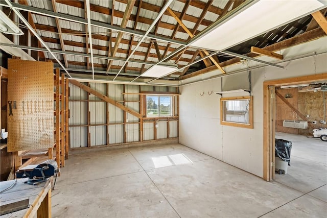 6119 28th Ave Dr, Vinton, IA 52349 - miscellaneous room featuring concrete flooring and a garage