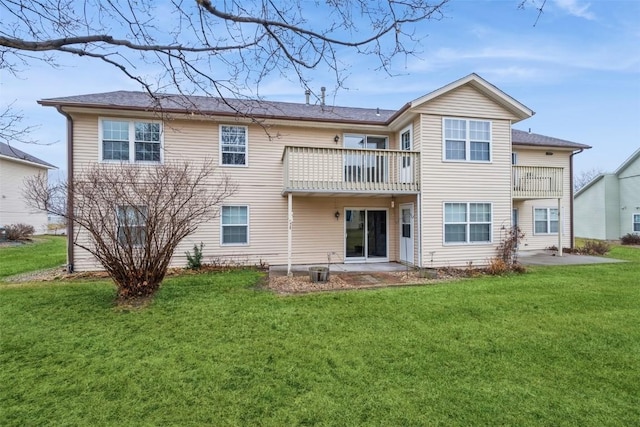 3912 Summerfield Ln NE Unit C, Cedar Rapids, IA 52402 - back of property featuring a balcony, a lawn, and a patio
