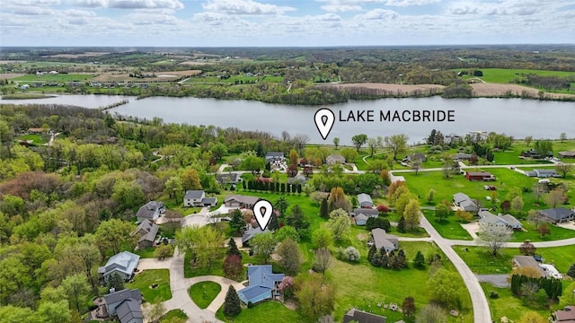 1659 Apache Dr NE, Solon, IA 52333 - aerial perspective of suburban area featuring a large body of water