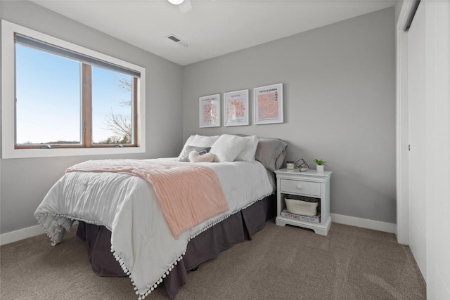 1659 Apache Dr NE, Solon, IA 52333 - bedroom featuring carpet floors and baseboards