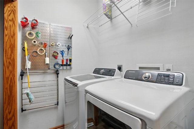 laundry room with washer and dryer