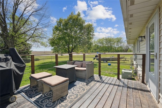 906 W 18th St, Vinton, IA 52349 - wooden terrace featuring a yard