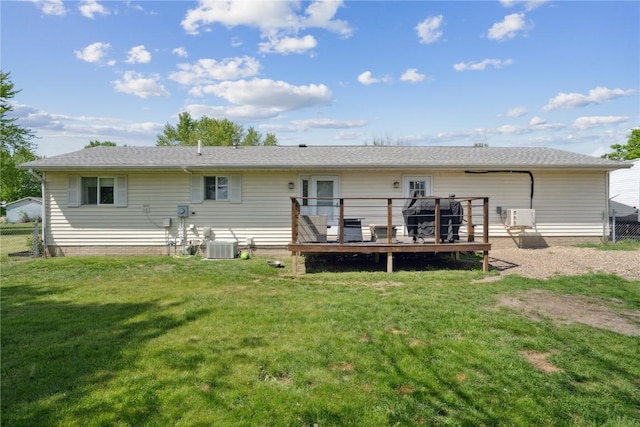 906 W 18th St, Vinton, IA 52349 - rear view of property featuring a wooden deck and cooling unit