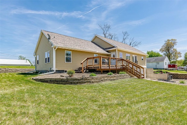 1100 Vernon Hill Blvd, Cedar Rapids, IA 52403 - rear view of house featuring a wooden deck, a yard, stairway, and a shingled roof