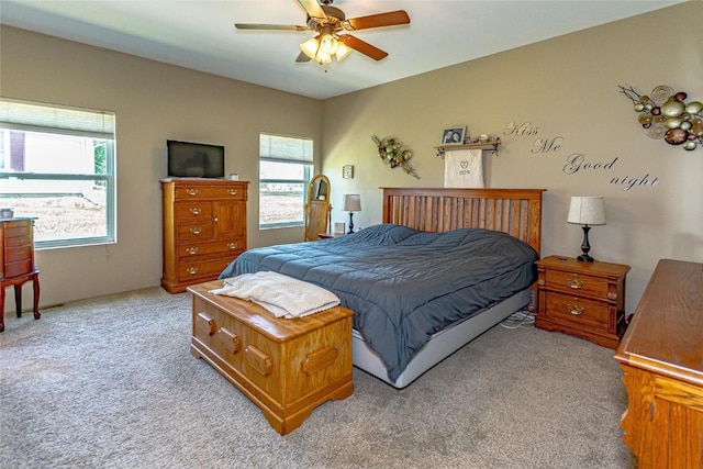 1100 Vernon Hill Blvd, Cedar Rapids, IA 52403 - bedroom featuring multiple windows, light colored carpet, and ceiling fan