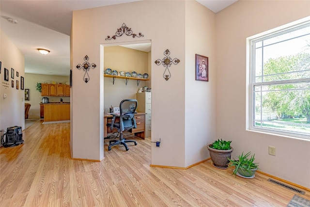 1100 Vernon Hill Blvd, Cedar Rapids, IA 52403 - corridor featuring light wood-type flooring, an office area, and baseboards