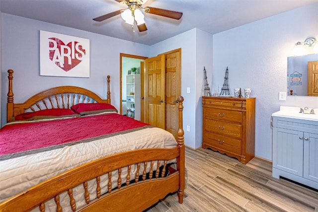 1100 Vernon Hill Blvd, Cedar Rapids, IA 52403 - bedroom with light wood-type flooring and a ceiling fan