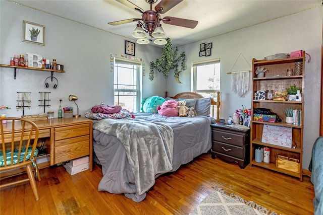 1100 Vernon Hill Blvd, Cedar Rapids, IA 52403 - bedroom with wood finished floors and a ceiling fan
