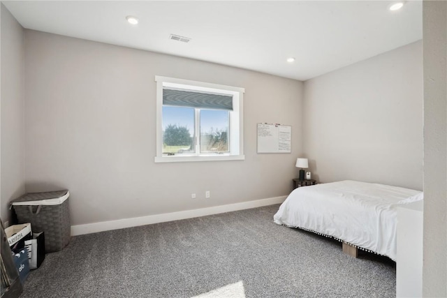 bedroom with baseboards, carpet, and recessed lighting