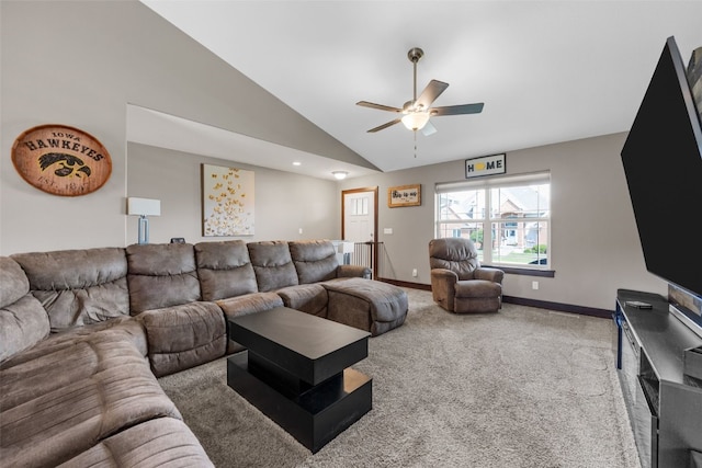 living area featuring a ceiling fan, carpet floors, baseboards, and high vaulted ceiling