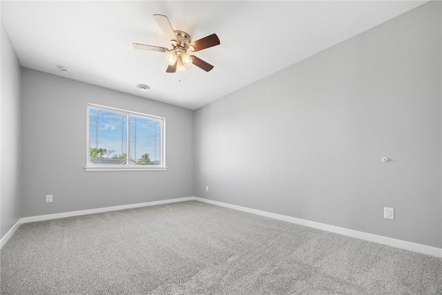 4803 Dostal Ct, Cedar Rapids, IA 52404 - empty room with a ceiling fan, carpet flooring, and baseboards