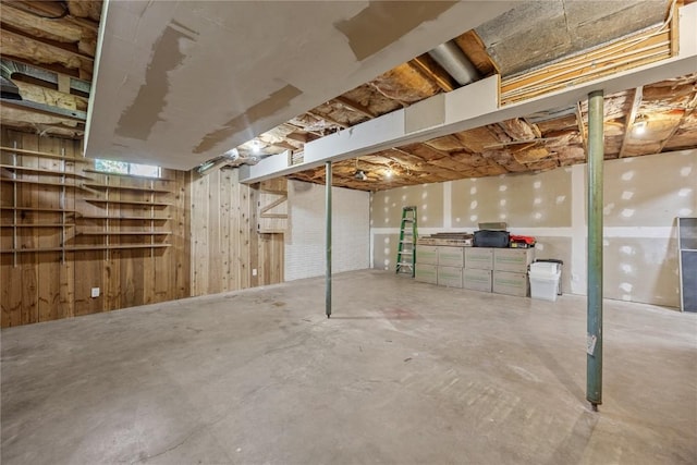 unfinished basement with wooden walls