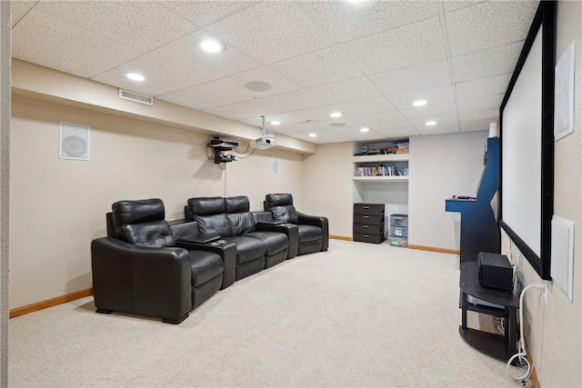 cinema featuring carpet flooring, baseboards, recessed lighting, and a paneled ceiling