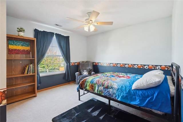 bedroom with carpet floors, baseboards, and ceiling fan