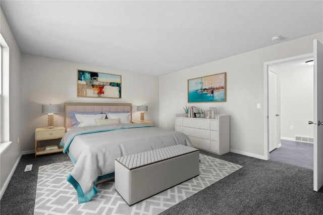bedroom featuring carpet and baseboards