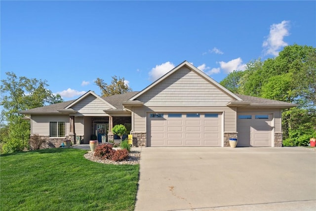 craftsman house with a garage, stone siding, a front lawn, and driveway