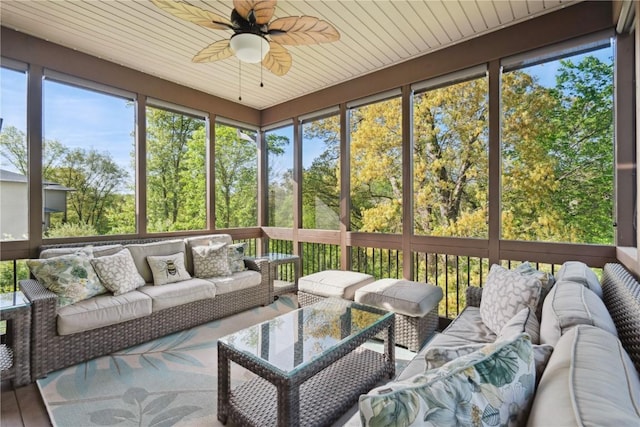 sunroom with an outdoor hangout area and a ceiling fan