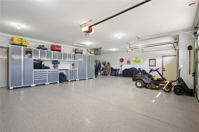 garage featuring a garage door opener