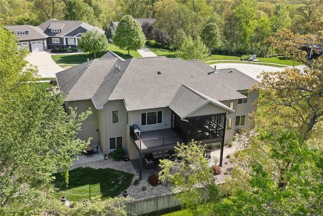 view from above of property featuring a forest