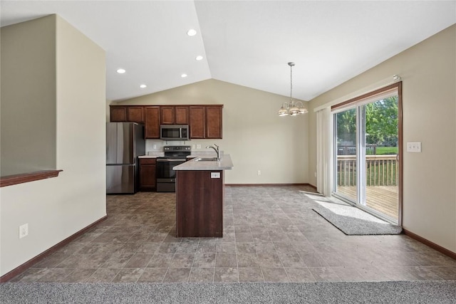 kitchen featuring stainless steel appliances, baseboards, vaulted ceiling, a chandelier, and a sink