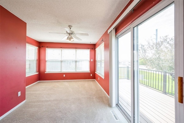 unfurnished sunroom with plenty of natural light
