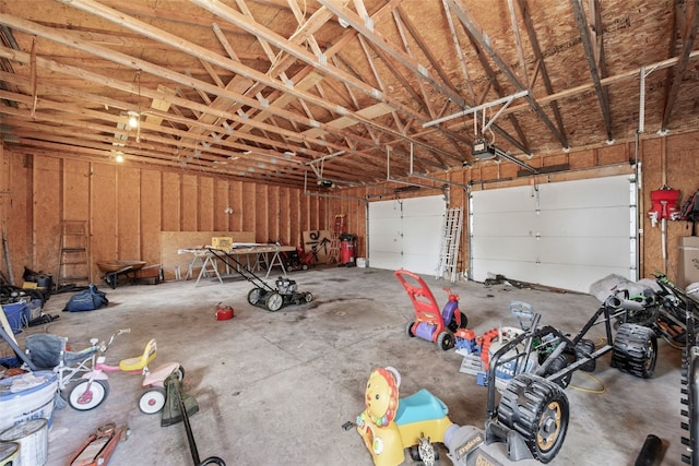 garage featuring a garage door opener