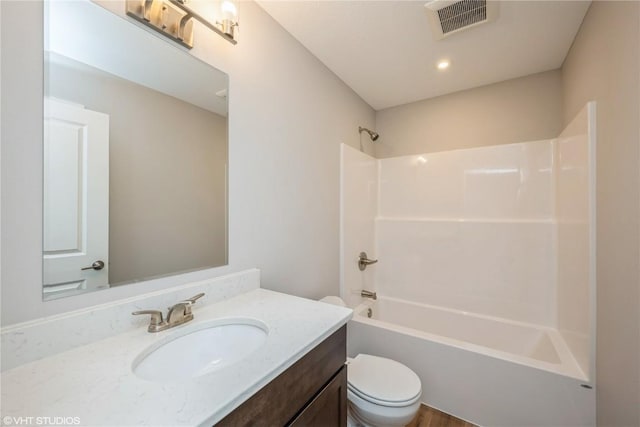 2740 Burns Dr, Marion, IA 52302 - bathroom featuring toilet, shower / washtub combination, and vanity