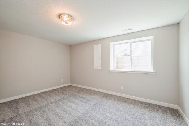 2740 Burns Dr, Marion, IA 52302 - carpeted spare room featuring baseboards