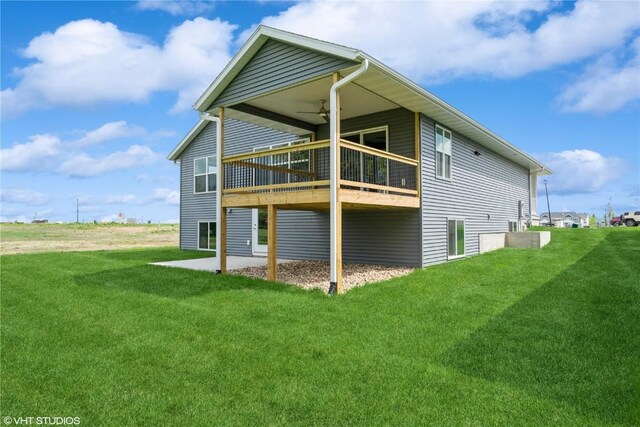 2740 Burns Dr, Marion, IA 52302 - rear view of property featuring a yard, a ceiling fan, and a wooden deck