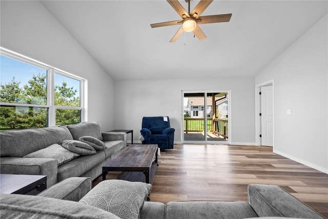 3850 Quail Trail Dr, Marion, IA 52302 - living room featuring vaulted ceiling, ceiling fan, wood finished floors, and baseboards