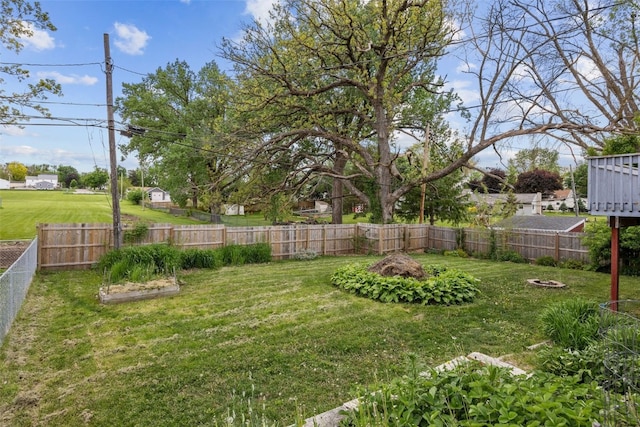 view of yard with an outdoor fire pit