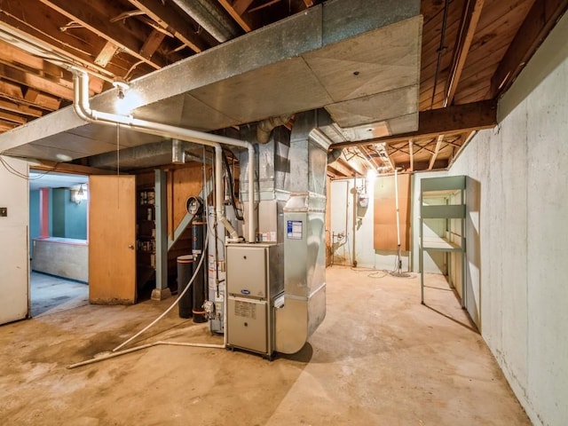 unfinished basement with heating unit