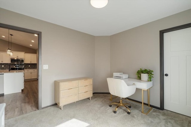 412 Dawson Dr, West Branch, IA 52358 - office space featuring vaulted ceiling, carpet floors, baseboards, and recessed lighting
