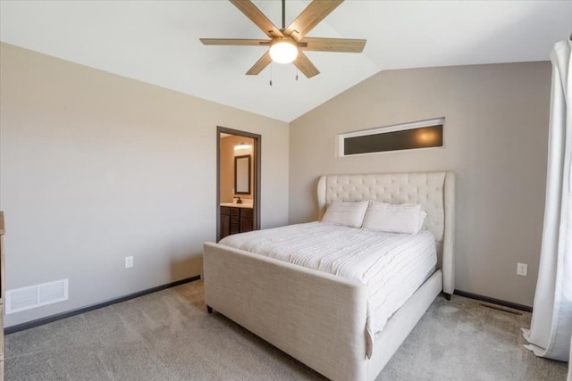 412 Dawson Dr, West Branch, IA 52358 - bedroom featuring carpet flooring, lofted ceiling, ceiling fan, baseboards, and connected bathroom