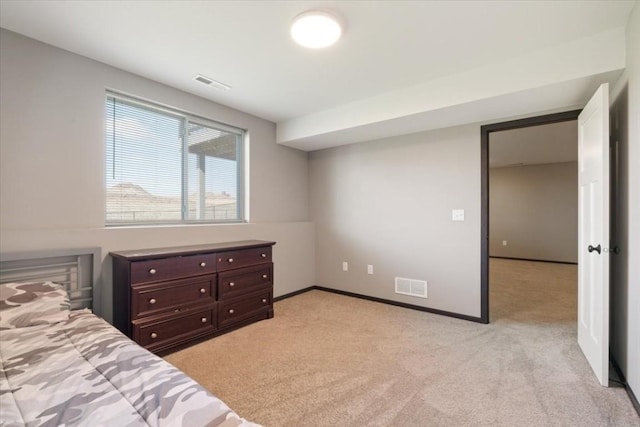 412 Dawson Dr, West Branch, IA 52358 - bedroom with light carpet and baseboards