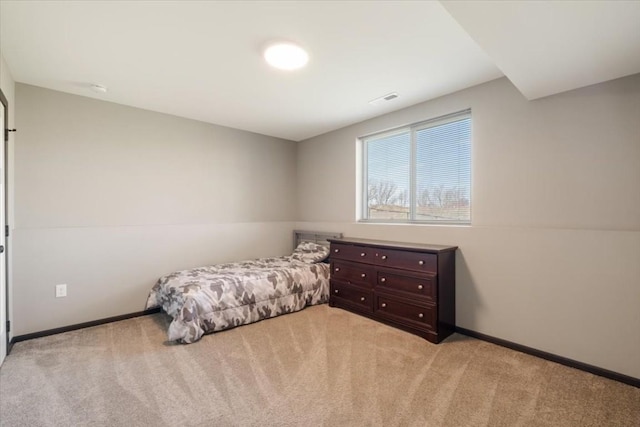 412 Dawson Dr, West Branch, IA 52358 - bedroom with light carpet and baseboards