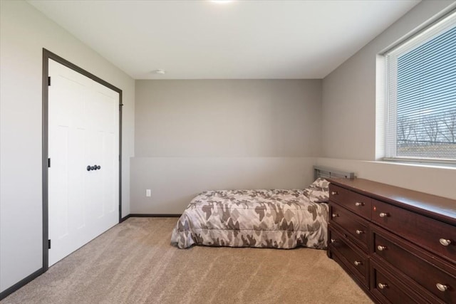 412 Dawson Dr, West Branch, IA 52358 - bedroom featuring light colored carpet