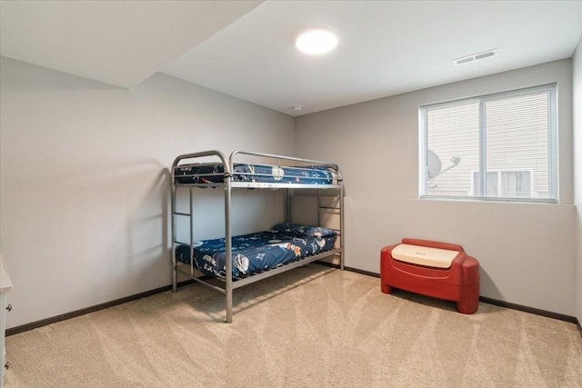 412 Dawson Dr, West Branch, IA 52358 - carpeted bedroom featuring baseboards