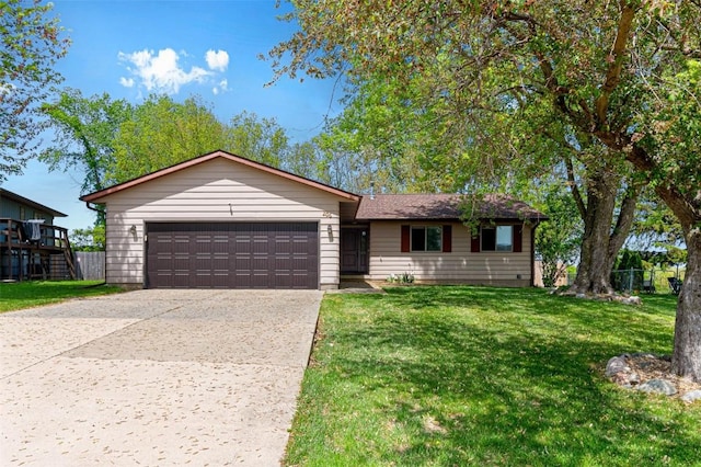 206 Hilltop Rd SW, Swisher, IA 52338 - ranch-style house featuring concrete driveway and a garage