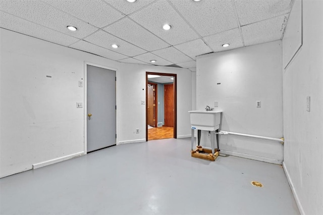 206 Hilltop Rd SW, Swisher, IA 52338 - finished basement with baseboards, recessed lighting, and a drop ceiling