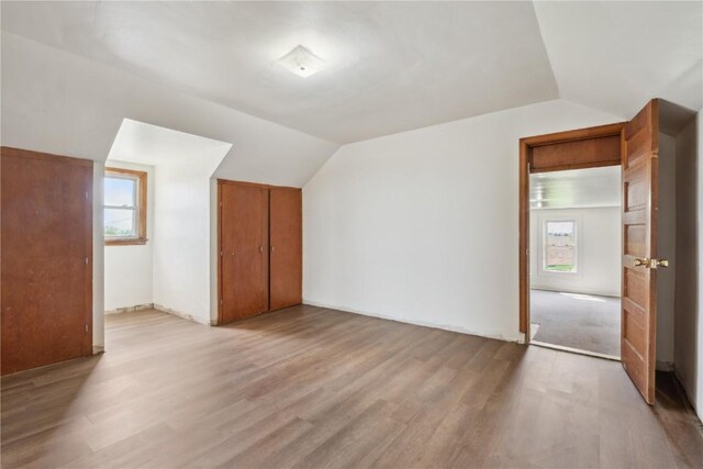 829 Union Ave, Lowden, IA 52255 - bonus room featuring vaulted ceiling, light wood-type flooring, and plenty of natural light