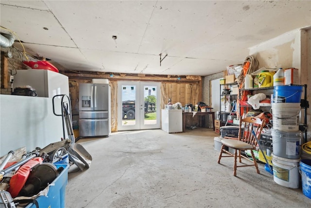 829 Union Ave, Lowden, IA 52255 - basement with stainless steel fridge, washer / clothes dryer, and french doors