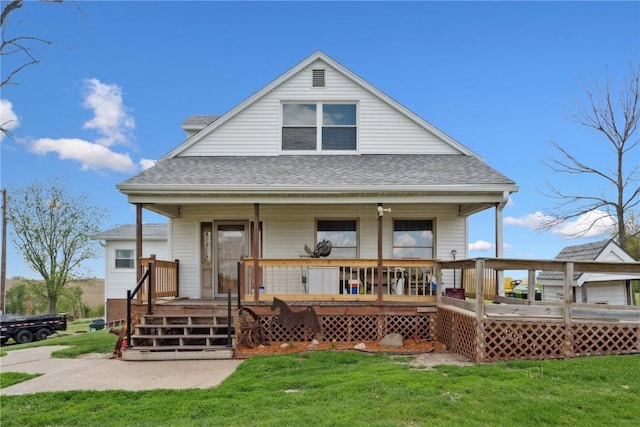 829 Union Ave, Lowden, IA 52255 - back of house with a shingled roof and a lawn