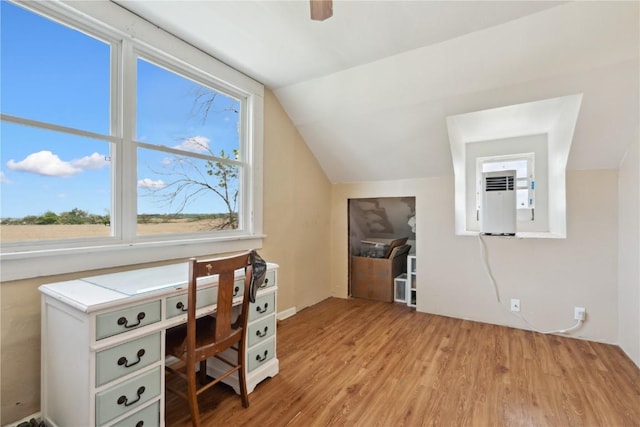 829 Union Ave, Lowden, IA 52255 - office featuring wood finished floors and vaulted ceiling