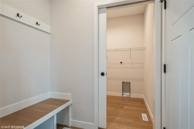 2559 Bluegrass St, Marion, IA 52302 - mudroom with baseboards and wood finished floors