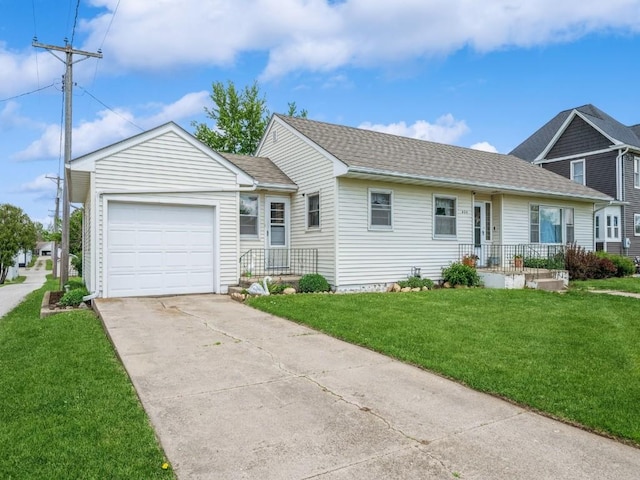 404 3rd St, Keystone, IA 52249 - ranch-style home featuring an attached garage, a front lawn, driveway, and roof with shingles