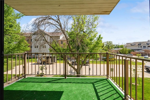 balcony featuring a residential view