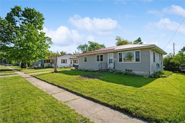 ranch-style home with a front yard
