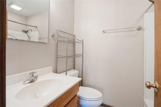 full bath featuring toilet and vanity